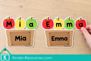 Apple letters spelling Mia and Emma above matching name crates, with a hand holding the final a in Emma.