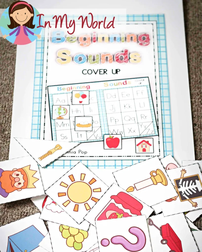 Child playing a beginning sounds file folder game to match pictures with their starting sounds, focusing on the letter G. Free printable available on the blog.