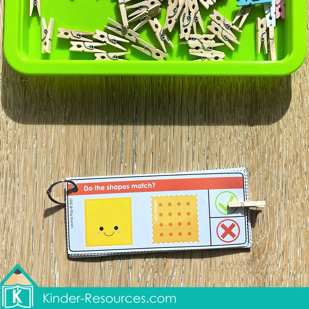 Printable shape matching activity for preschool and kindergarten. Children look at the 2D shape and a real-life object, then clip to show if they match. Builds geometry vocabulary, visual discrimination, and fine motor skills. Perfect for morning tubs, math centers, or small groups. Free sample pages available on the blog.