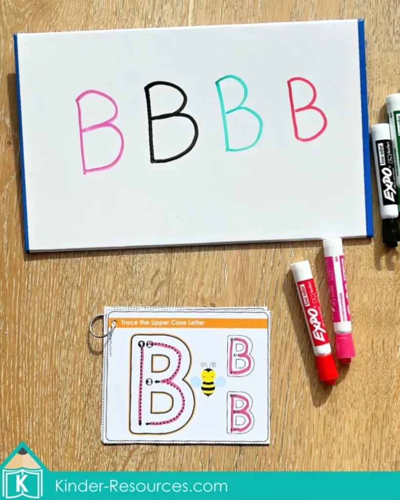 Printable uppercase letter tracing cards for kindergarten morning tubs and literacy centers. Children practice handwriting by tracing each capital letter with a dry-erase marker. Perfect for letter formation, fine motor skills, and independent practice. Free sample pages available on the blog.