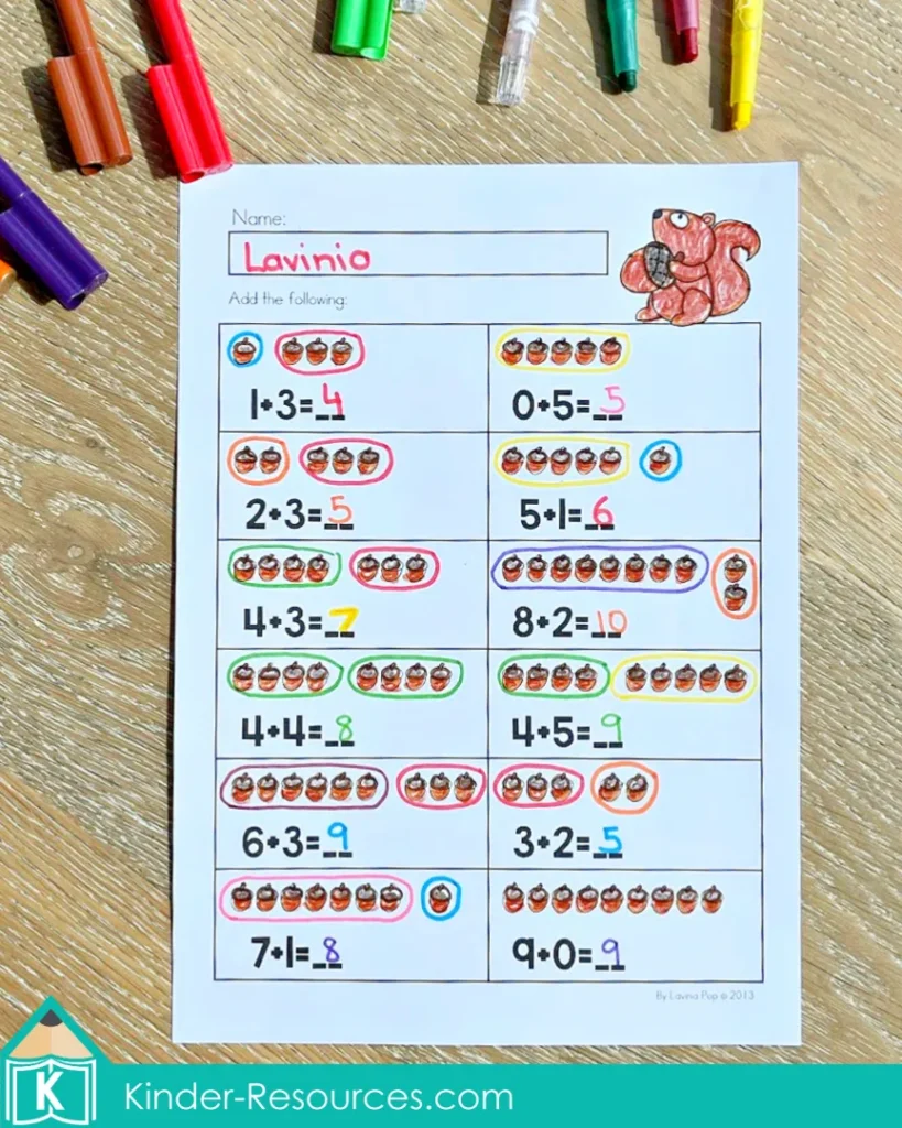 Fall kindergarten math worksheet with acorn illustrations where children solve simple addition problems up to 10 using visual supports to build number sense.