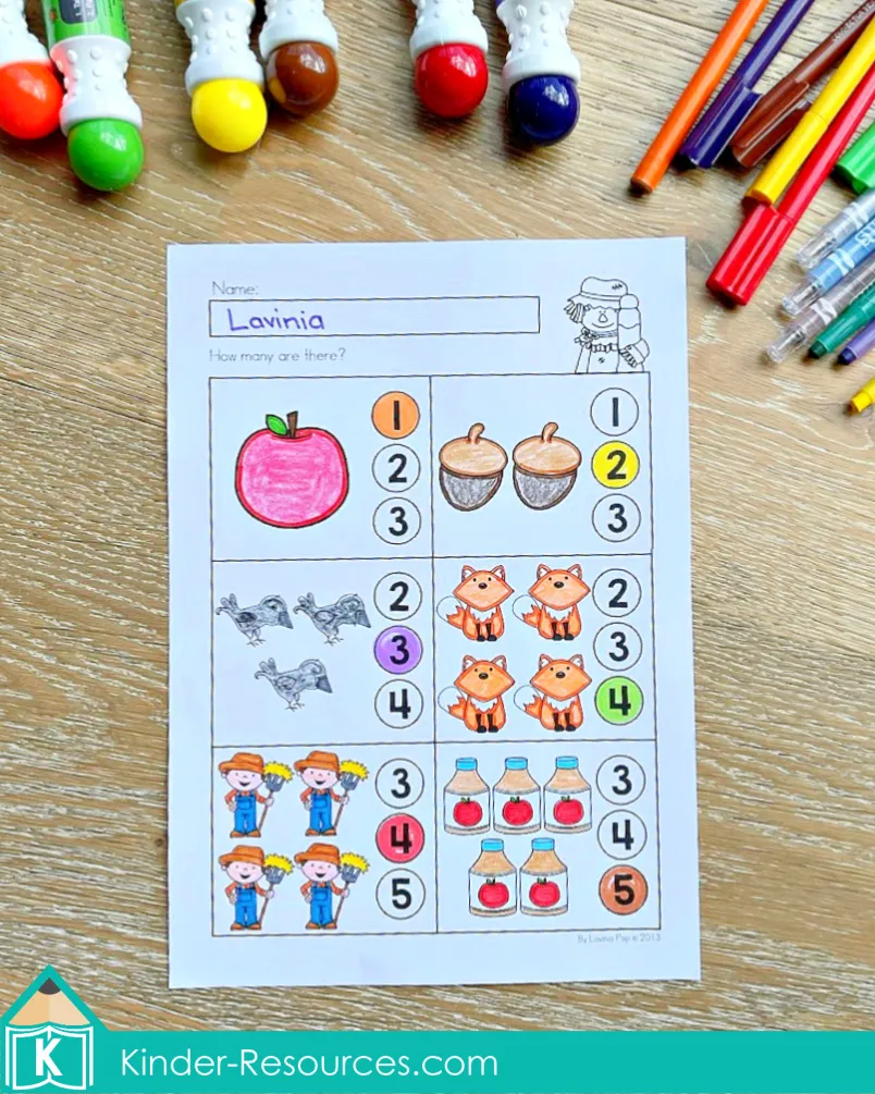 Kindergarten counting worksheet for fall with acorns, foxes, apples, and scarecrows where children count objects and circle the correct number.