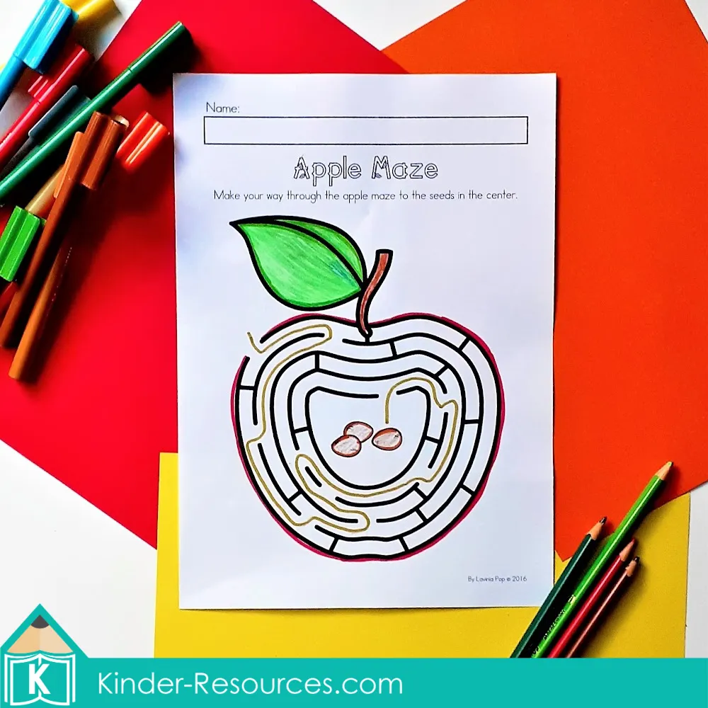Printable apple maze worksheet for preschool and kindergarten where children trace the path through the apple to the seeds in the center.