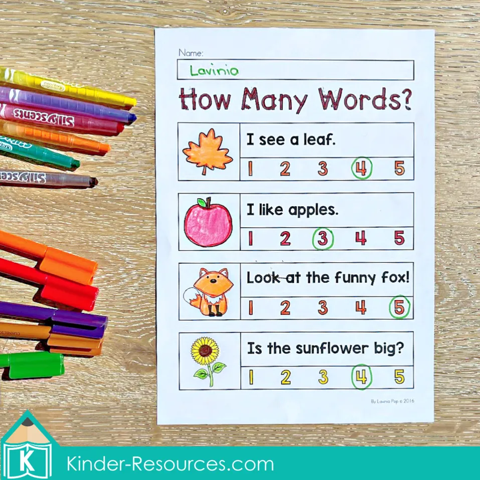 Preschool autumn worksheet for counting words in sentences with fall-themed pictures like leaves, apples, fox, and sunflower.