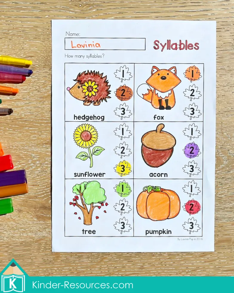 Fall syllable sorting worksheet for preschool and kindergarten with pictures of hedgehog, fox, sunflower, acorn, tree, and pumpkin.