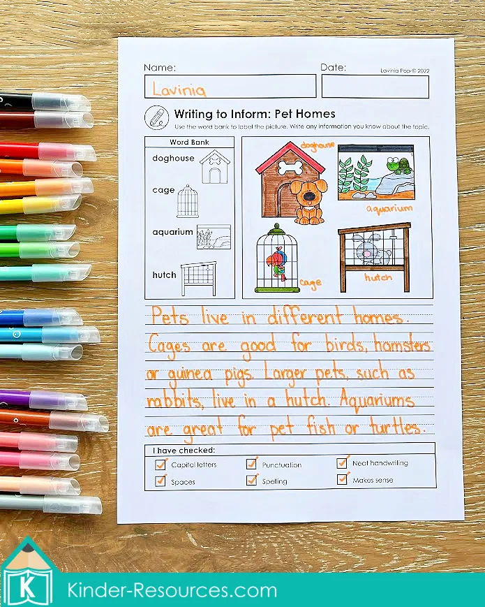 Informational writing worksheet with word bank doghouse, cage, aquarium, and hutch for labeling and writing. September writing prompts for 1st and 2nd grade.