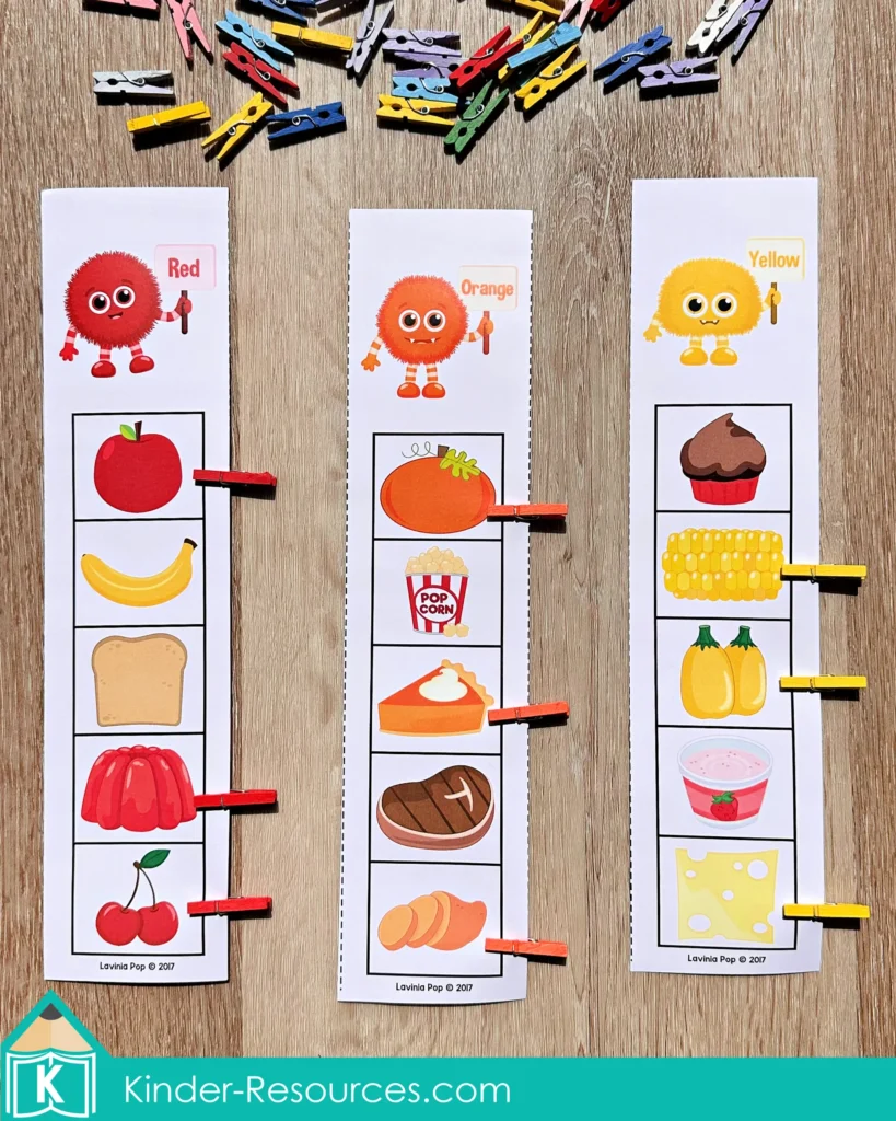 Thanksgiving color sorting activity from the Thanksgiving Math Centers for Kindergarten packet. Children clip matching colored foods—red, orange, and yellow—using small clothespins to strengthen fine motor skills and color recognition. Includes foods like apples, pumpkins, and corn. Perfect for fall-themed math or sorting centers. Free sample pages are available to download on the blog.
