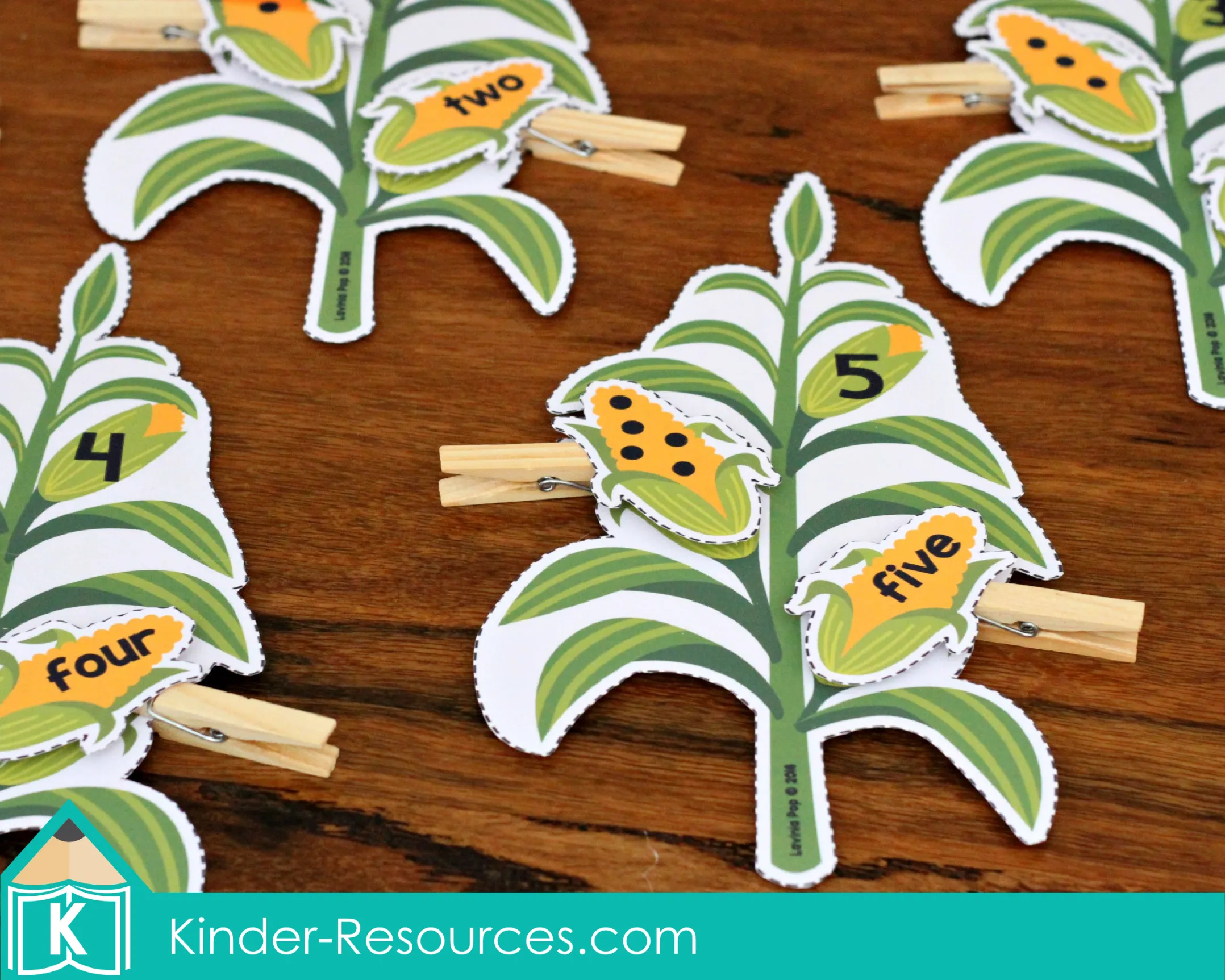 Thanksgiving preschool math center with corn counting clip cards for numbers 1 to 10 using clothespins to match numerals, number words, and dots