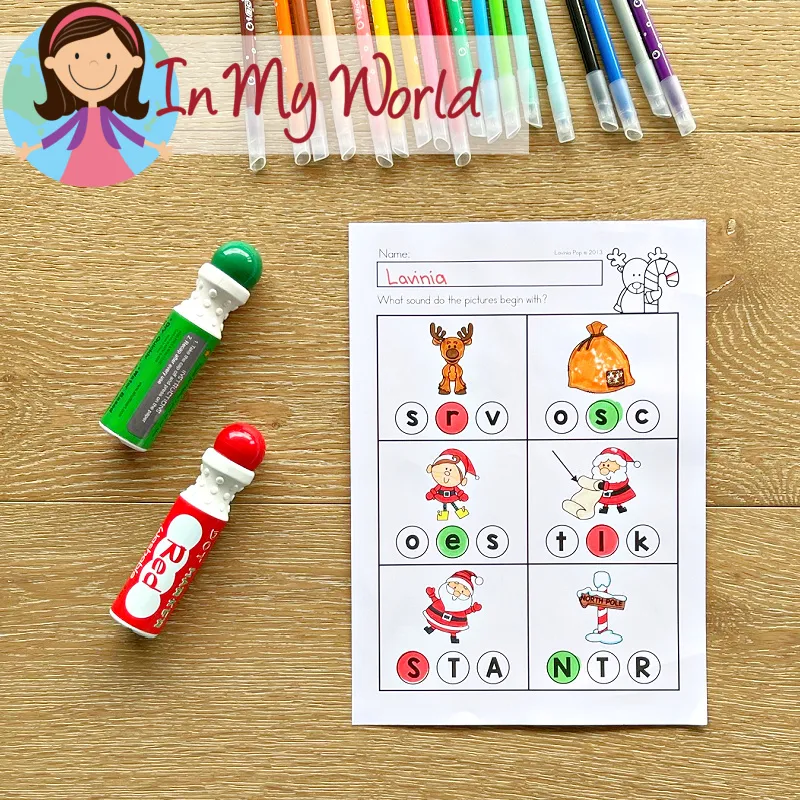 Christmas Kindergarten Worksheets and Activities beginning sounds page using Christmas themed pictures for phonemic awareness.