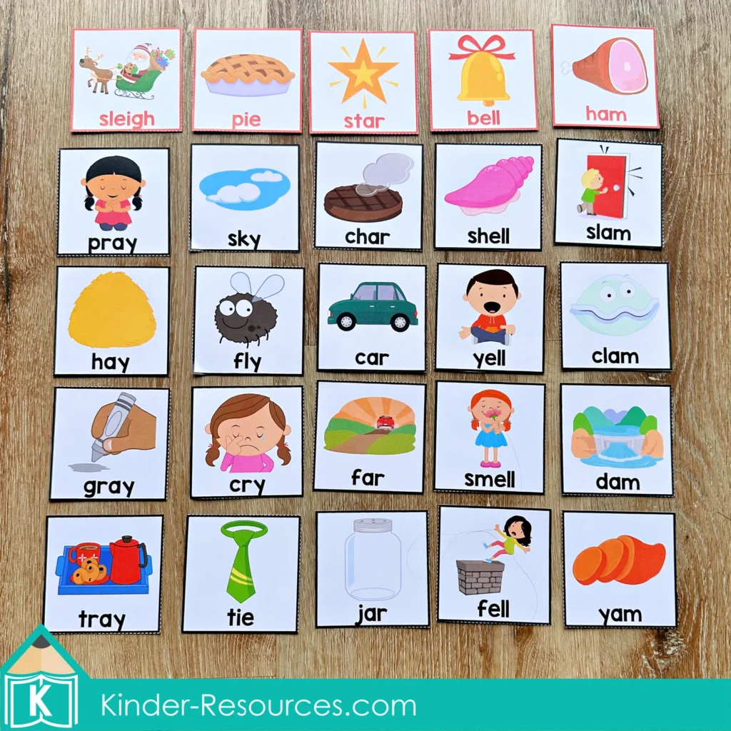 Christmas Literacy Centers for Kindergarten rhyming picture cards arranged in a grid to support rhyme recognition and phonological awareness.