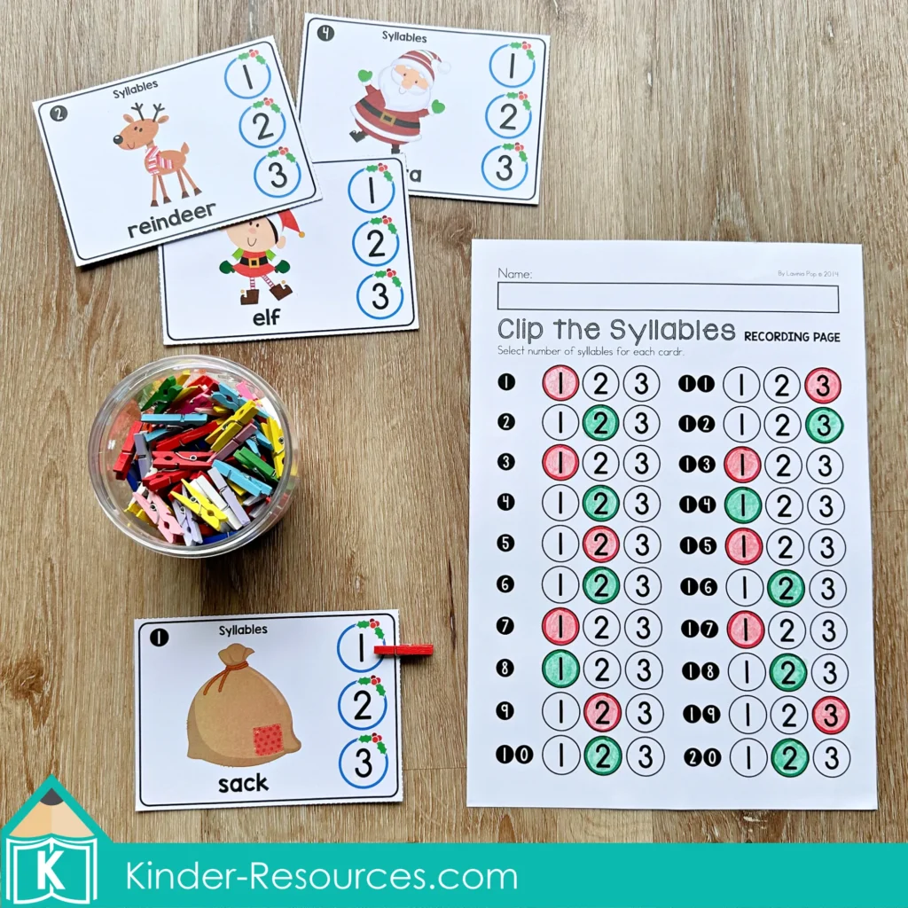 Christmas Literacy Centers for Kindergarten syllable clip cards with holiday pictures and numbered circles to practice hearing syllables.
