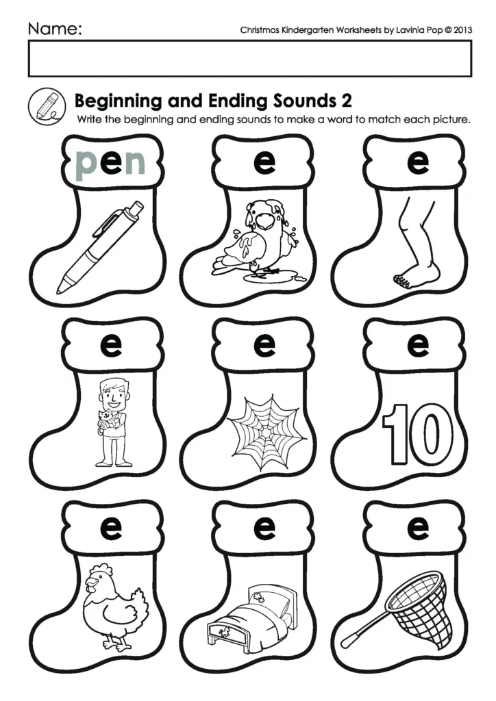Kindergarten Christmas Worksheets beginning and ending sounds activity with Christmas stockings holding pictures for children to write the starting and ending letters.