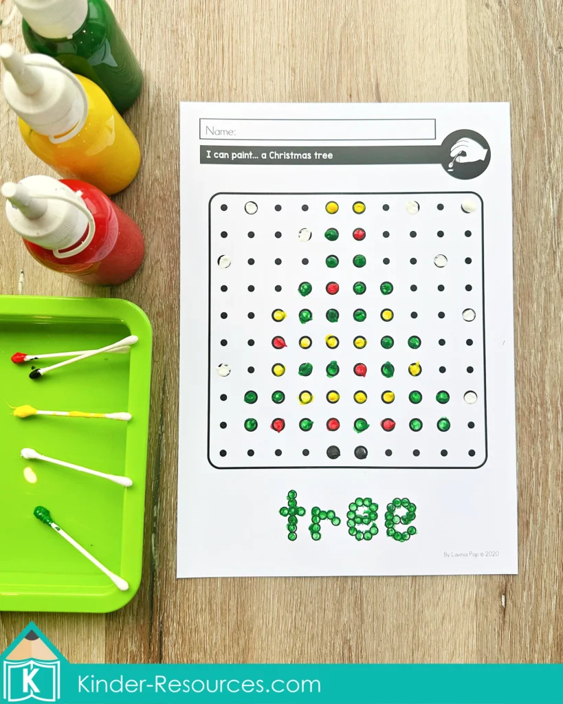 Christmas pegboard mosaic puzzle dot painting page of a Christmas tree using red, green, and yellow paint with cotton buds on a tray.