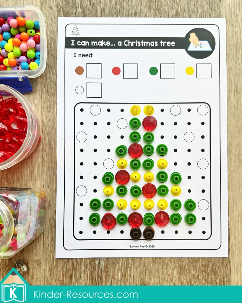 Christmas pegboard mosaic puzzle Christmas tree made with colorful beads and gems arranged on the pegboard activity sheet.