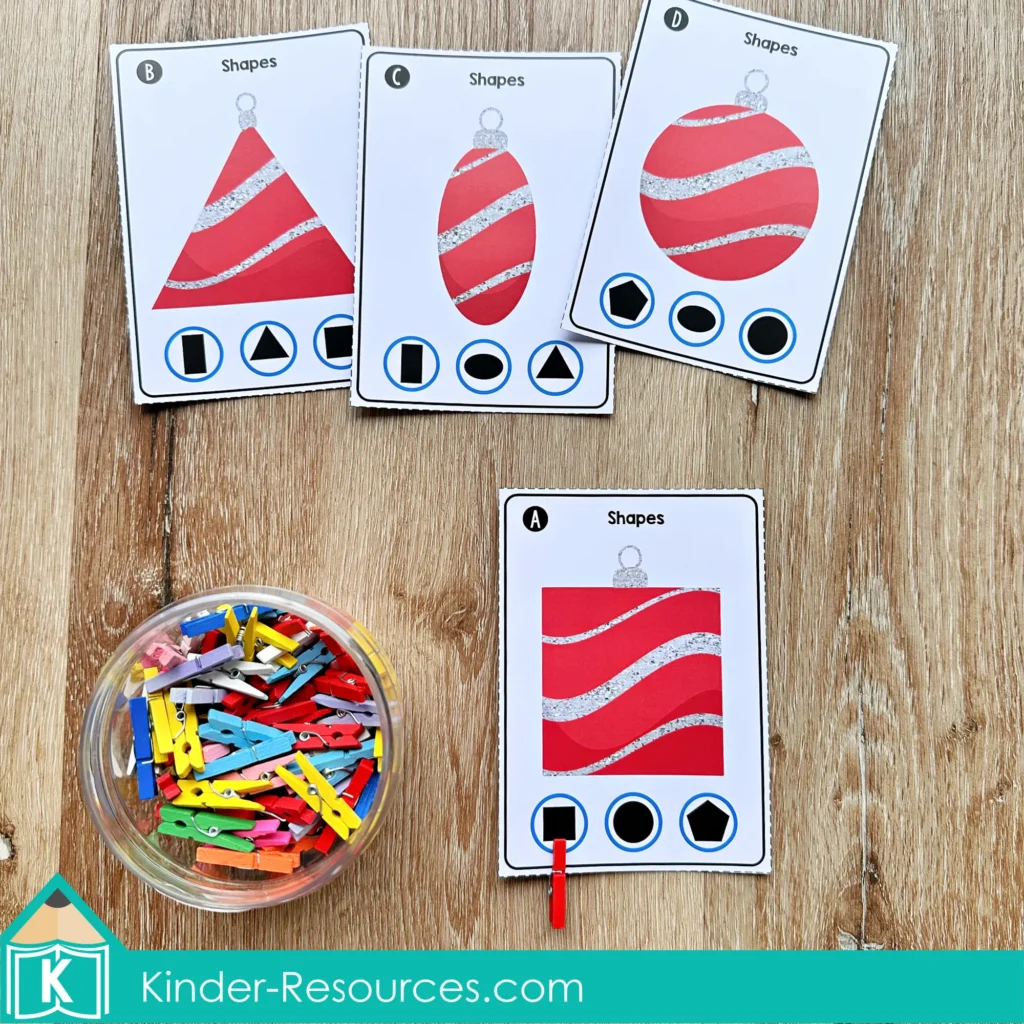 Christmas Math Centers for Kindergarten shape clip cards with ornament shapes for identifying and matching 2D shapes