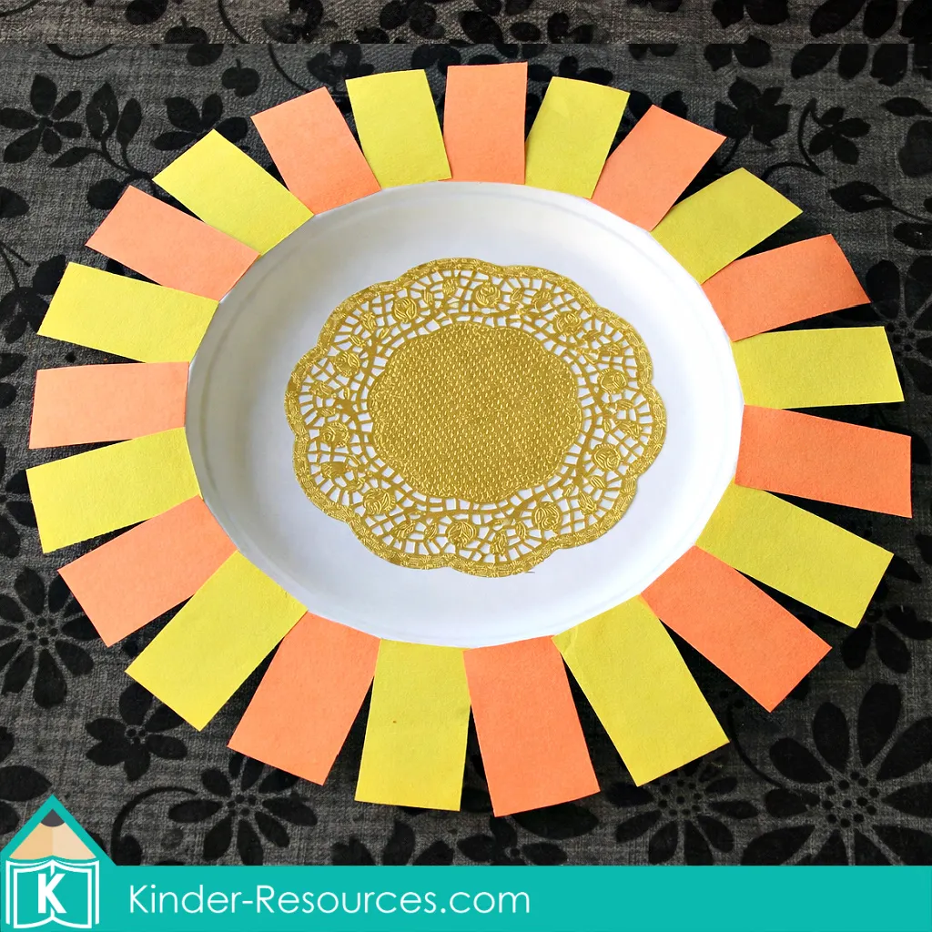Preschool Bible Lesson God Made the Sun Moon and Stars sun paper plate craft with yellow and orange rays