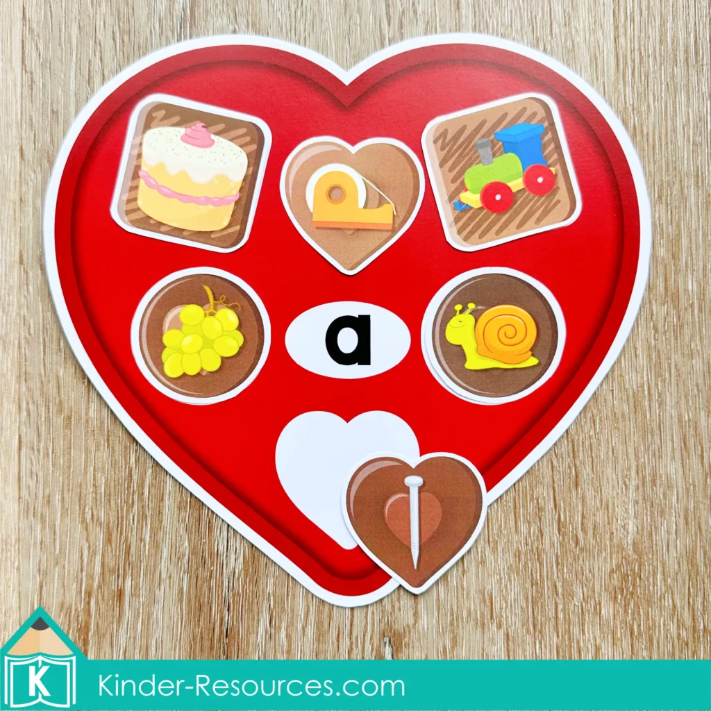 Valentine’s Day Literacy Centers for Kindergarten vowel middle sound sorting cards for phonics center practice