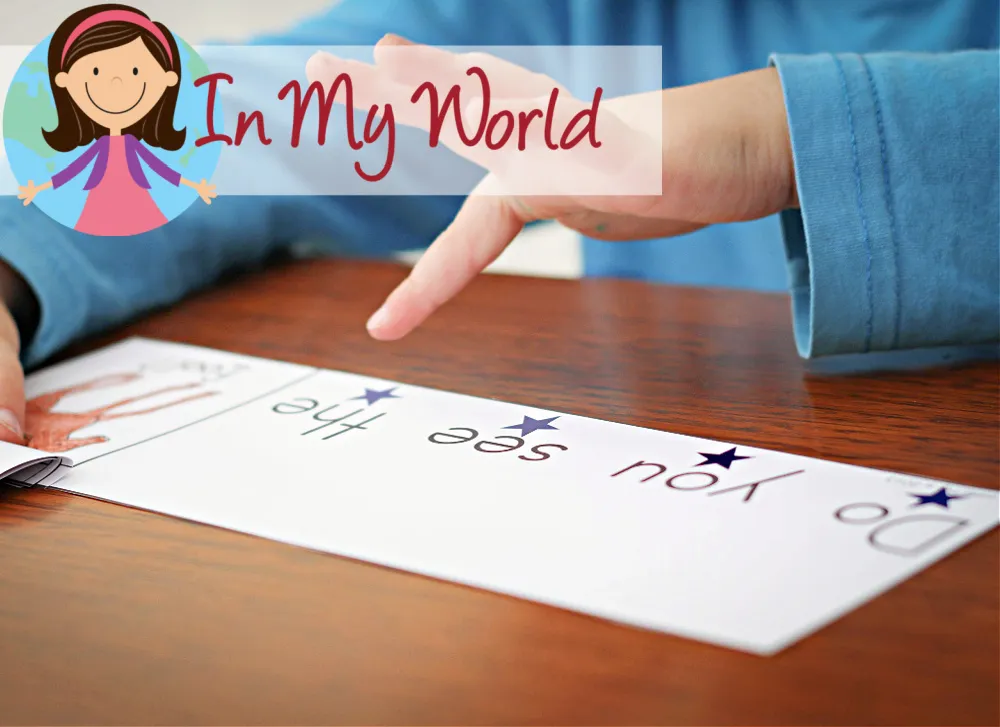 Preschool child pointing to sight word sentence strip that reads “Do you see the” during Letter F literacy activity