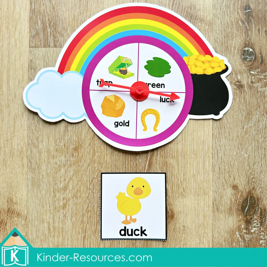 St. Patrick’s Day Literacy Centers for Kindergarten March Morning Tubs spin and rhyme activity with word cards like luck, trap, gold, green, duck, map, and truck.
