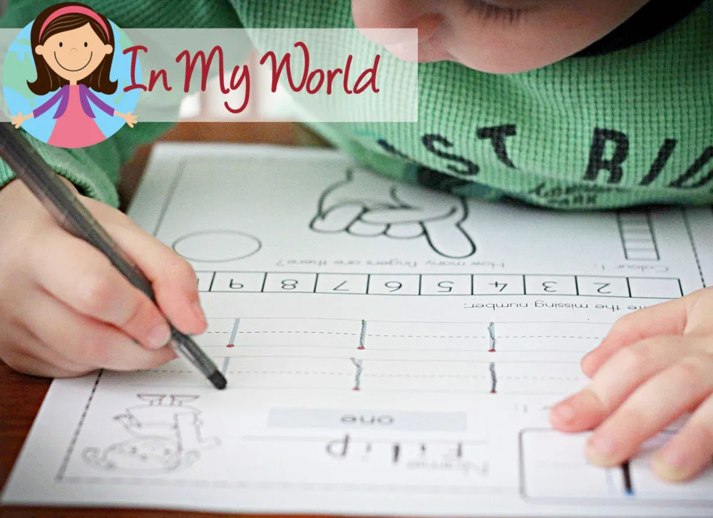 Preschool Letter I activities tracing number 1 on worksheet to practice number formation and handwriting