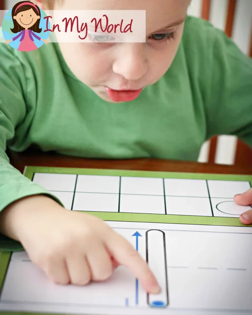 Preschool Letter I activities finger tracing number 1 on play dough mat for number formation practice