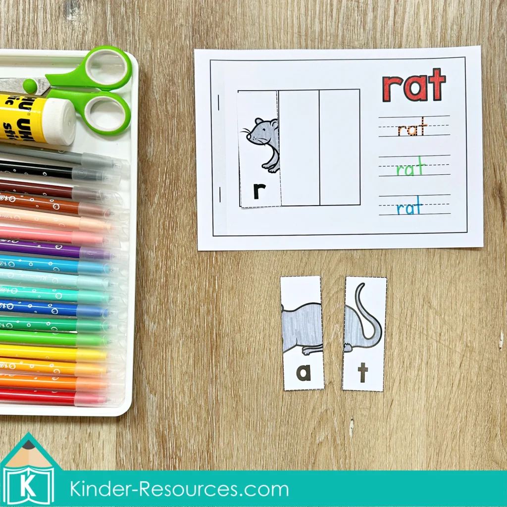 CVC Word Family Picture Puzzles rat activity with cut letter pieces, writing lines, markers, scissors, and glue.