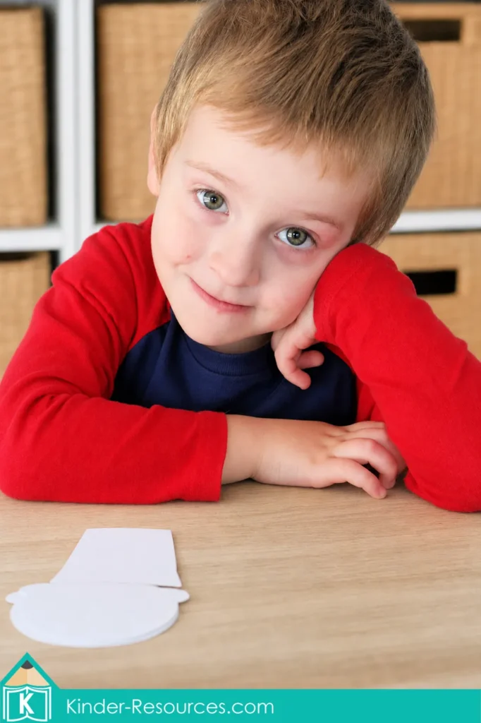 Face down ice cream scoop pieces during a preschool Letter J activity.