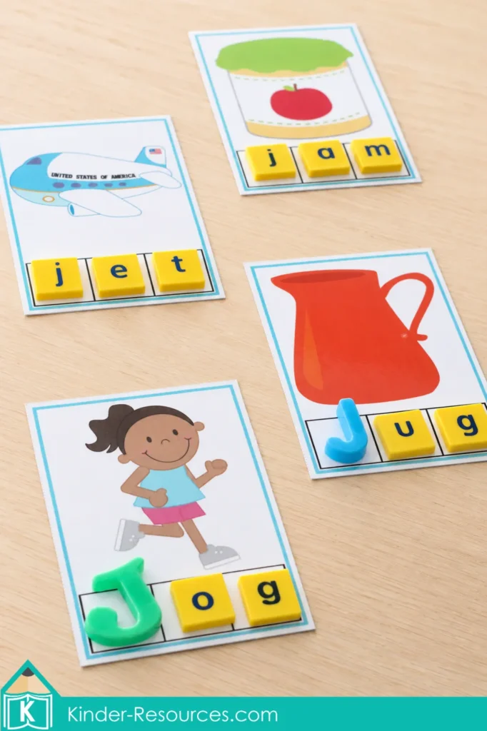 Preschool letter J word building cards with magnetic letters spelling jet, jam, jug, and jog.