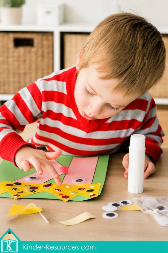 Child decorating a preschool letter K king craft with a paper crown, googly eyes, pom-pom, and sequins for alphabet learning.
