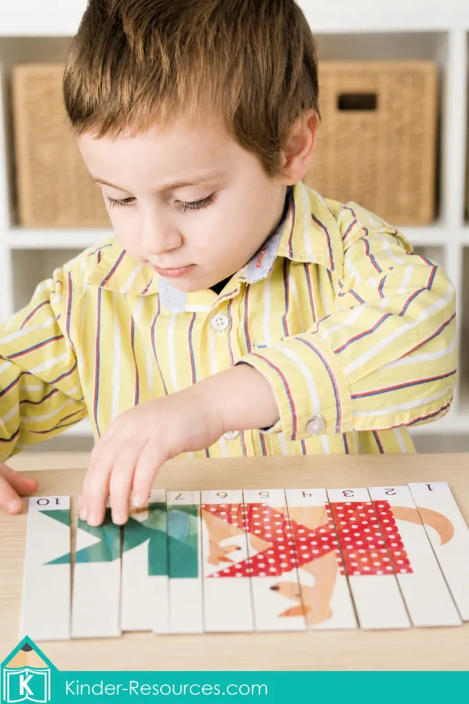Child assembling a kangaroo picture puzzle numbered 1 to 10 during a preschool letter K math and sequencing activity.