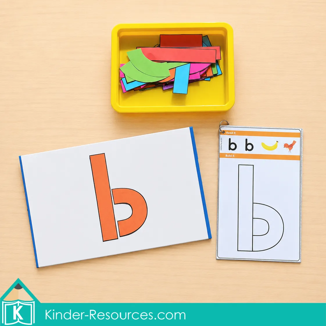 Comparing a completed lowercase b on a whiteboard with an outlined lowercase b activity card.