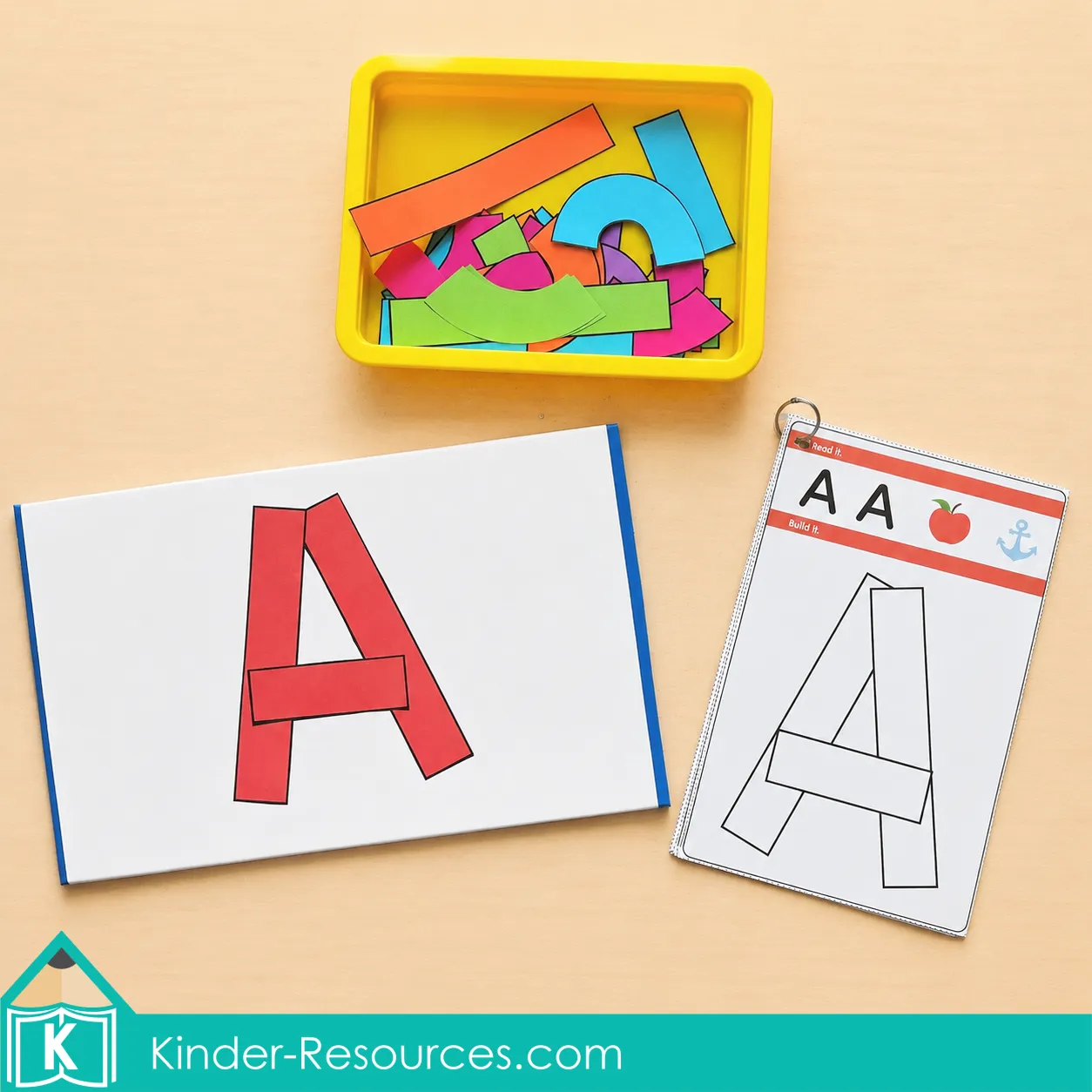 Comparing a completed uppercase A on a whiteboard with an outlined uppercase A activity card.