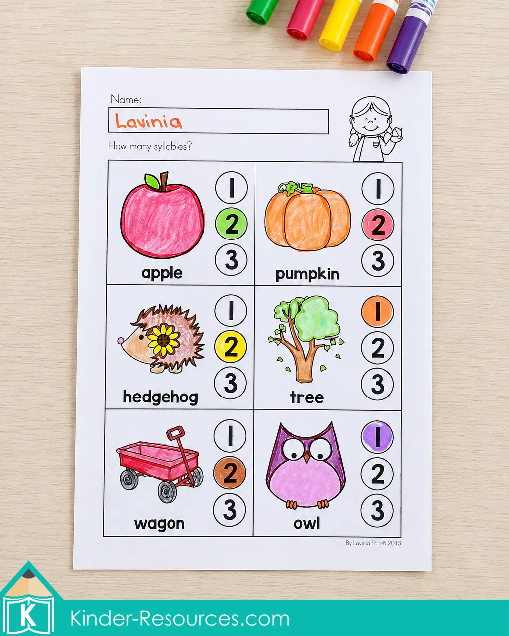 Counting the syllables in fall vocabulary words and coloring the correct number on an autumn literacy worksheet for kindergarten.