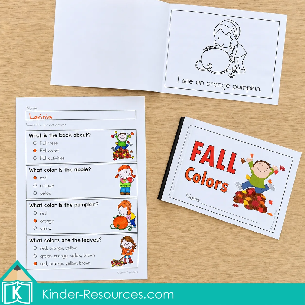 Reading a fall colors emergent reader and answering comprehension questions using autumn literacy worksheets for kindergarten.