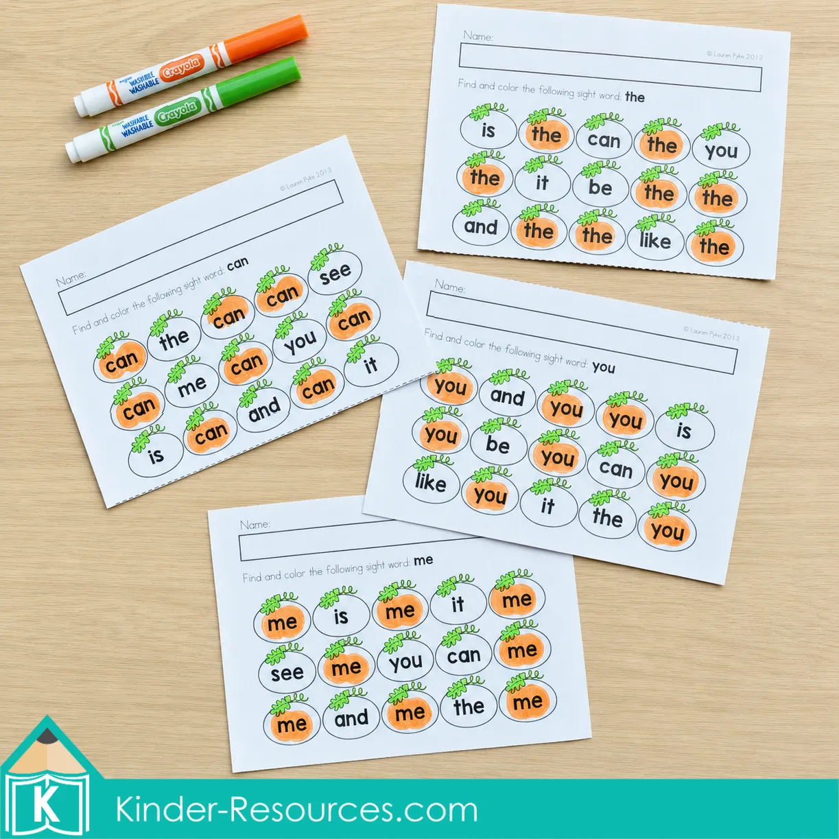 Finding and coloring matching sight words inside pumpkins using autumn literacy worksheets for kindergarten.