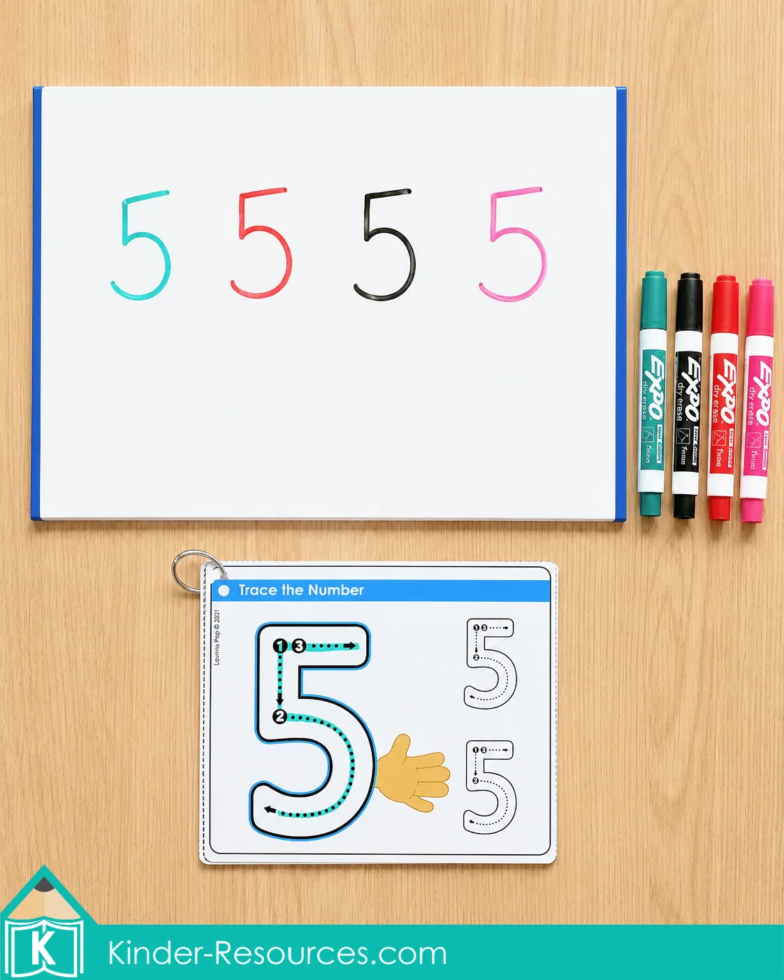 Using a number 5 tracing card and dry erase board to practice number formation with colorful markers.