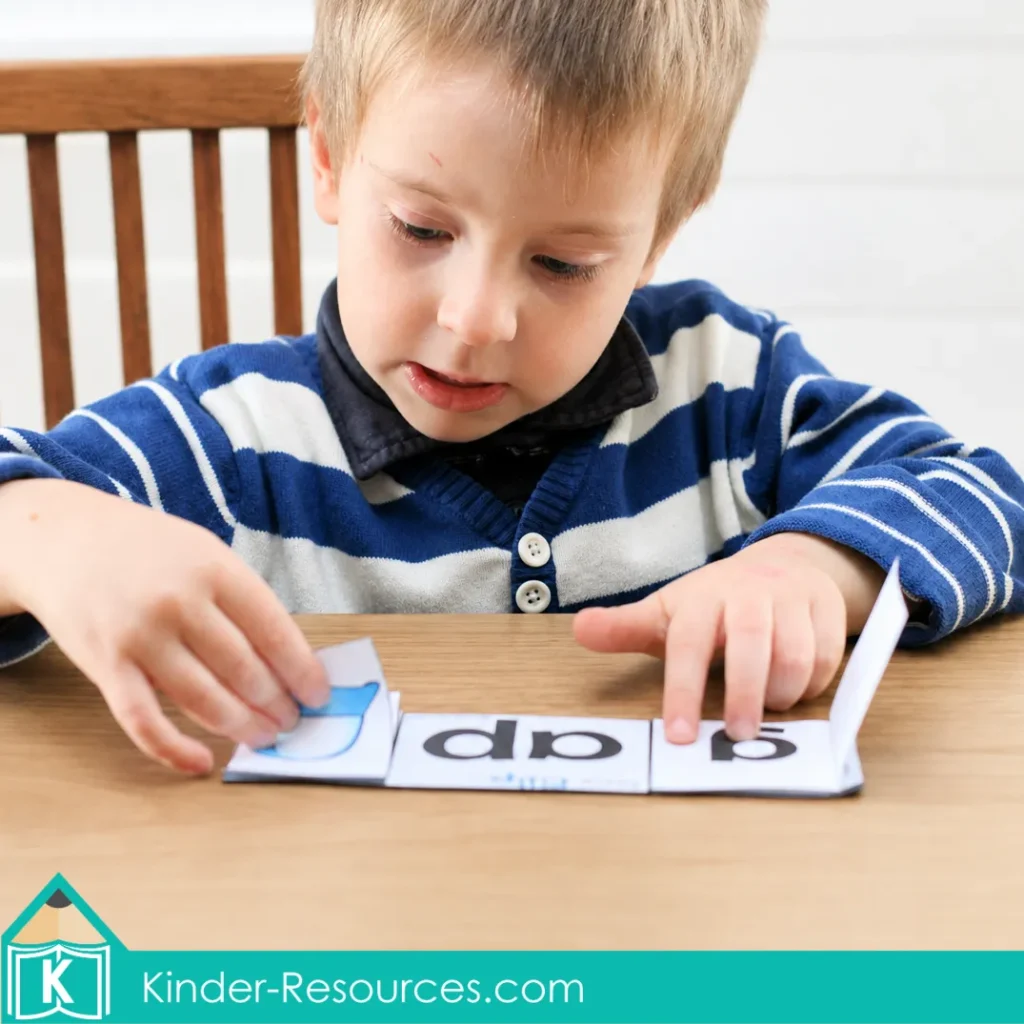 Preschool child using an AP word-family flip-flap book to match beginning letters with pictures.