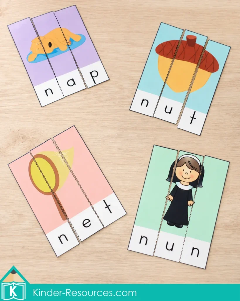 Three-piece preschool CVC picture puzzles for the words nap, nut, net and nun arranged on a pale wooden table.