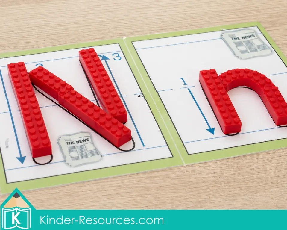 Uppercase N and lowercase n letter formation mats built with red interlocking bricks for preschool alphabet practice.