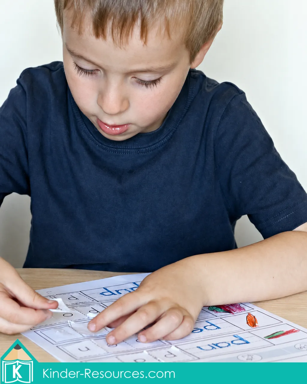 leted CVC cut and paste worksheet with pictures matched to the correct three letter words.