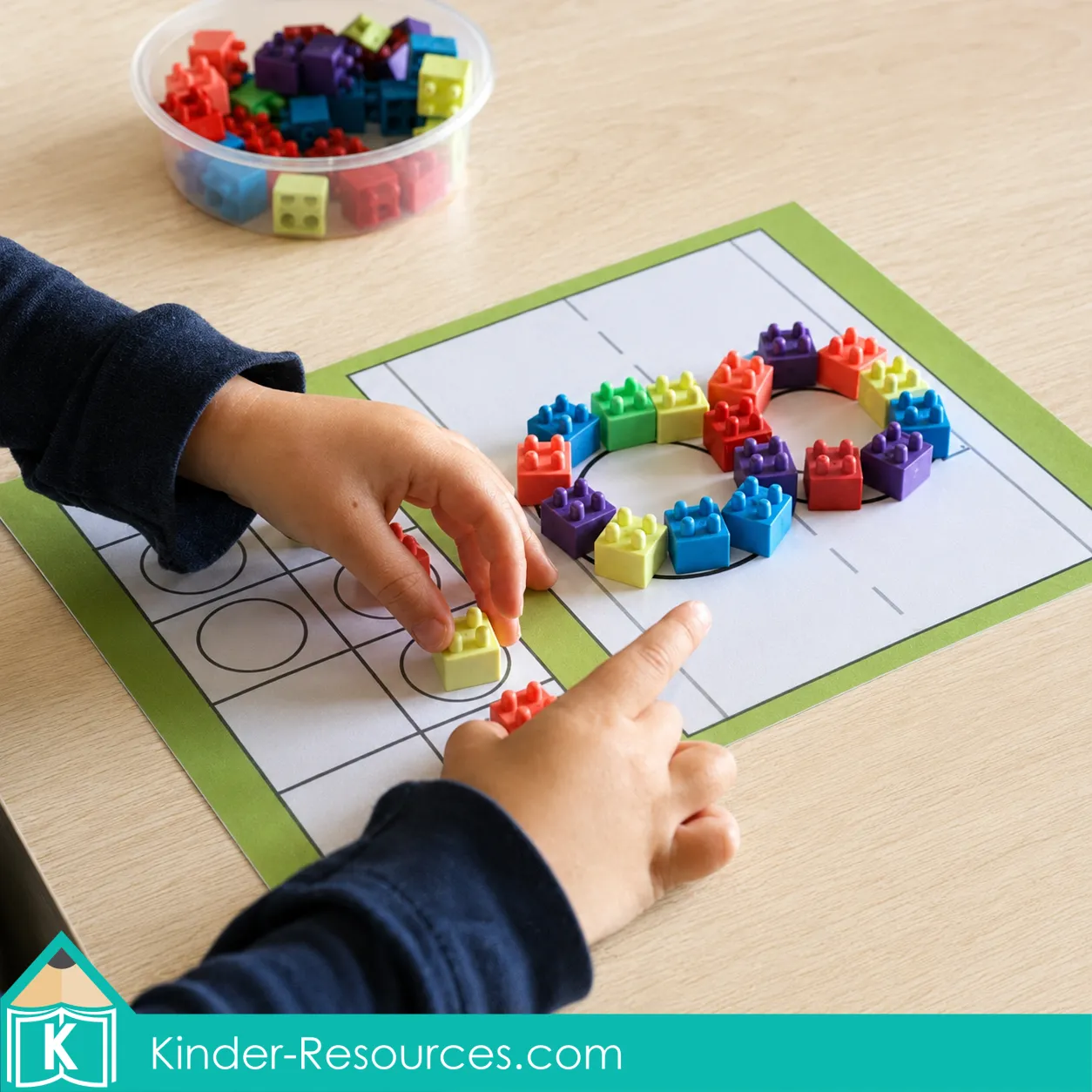 Using colorful building brick erasers to form number 8 and fill a ten frame on a printable number mat.