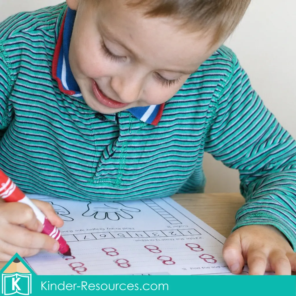 Completing a number 8 concepts worksheet with numeral tracing, counting, and different representations of eight.