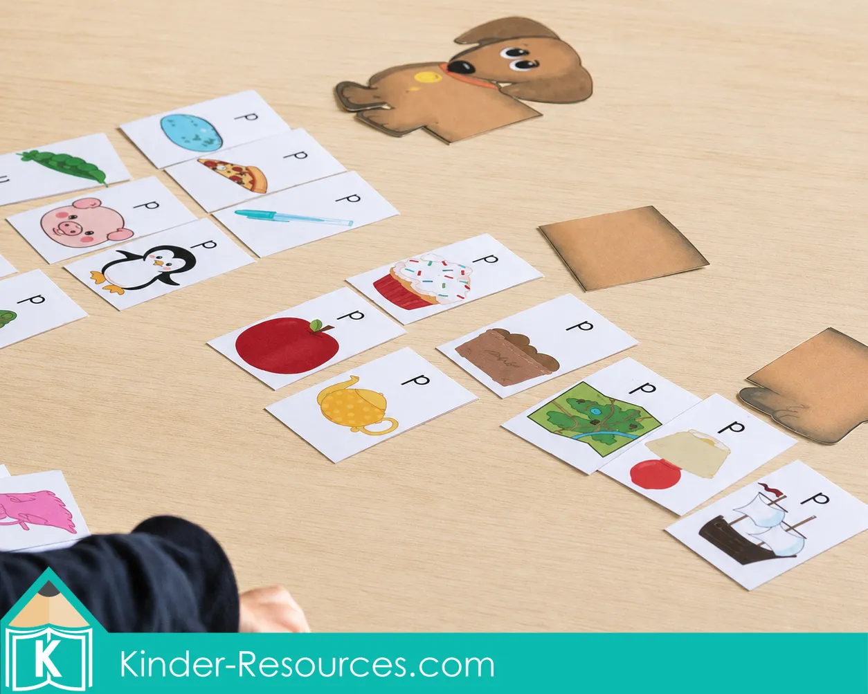 Sorting picture cards with the printable Sound Hound game to identify the P sound in different positions within words.