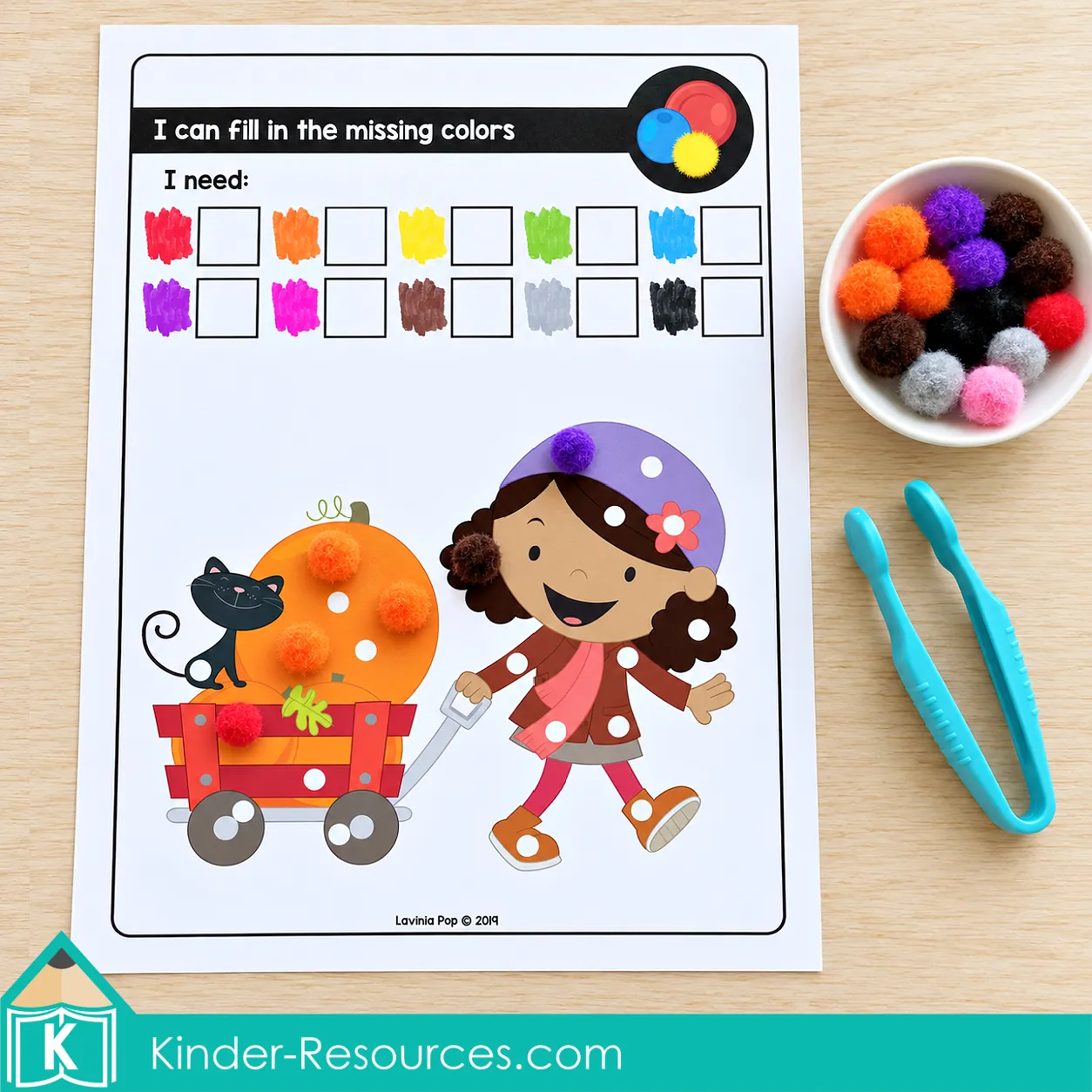 ctober fine motor morning tubs missing colors activity for preschool using pom poms and tweezers to practice color matching, grip strength, and fine motor control.