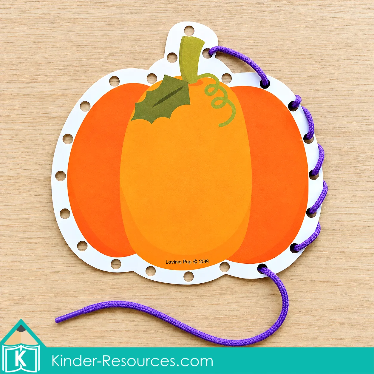 October fine motor morning tubs pumpkin lacing card for preschool and kindergarten to practice threading, bilateral coordination, and fine motor precision.