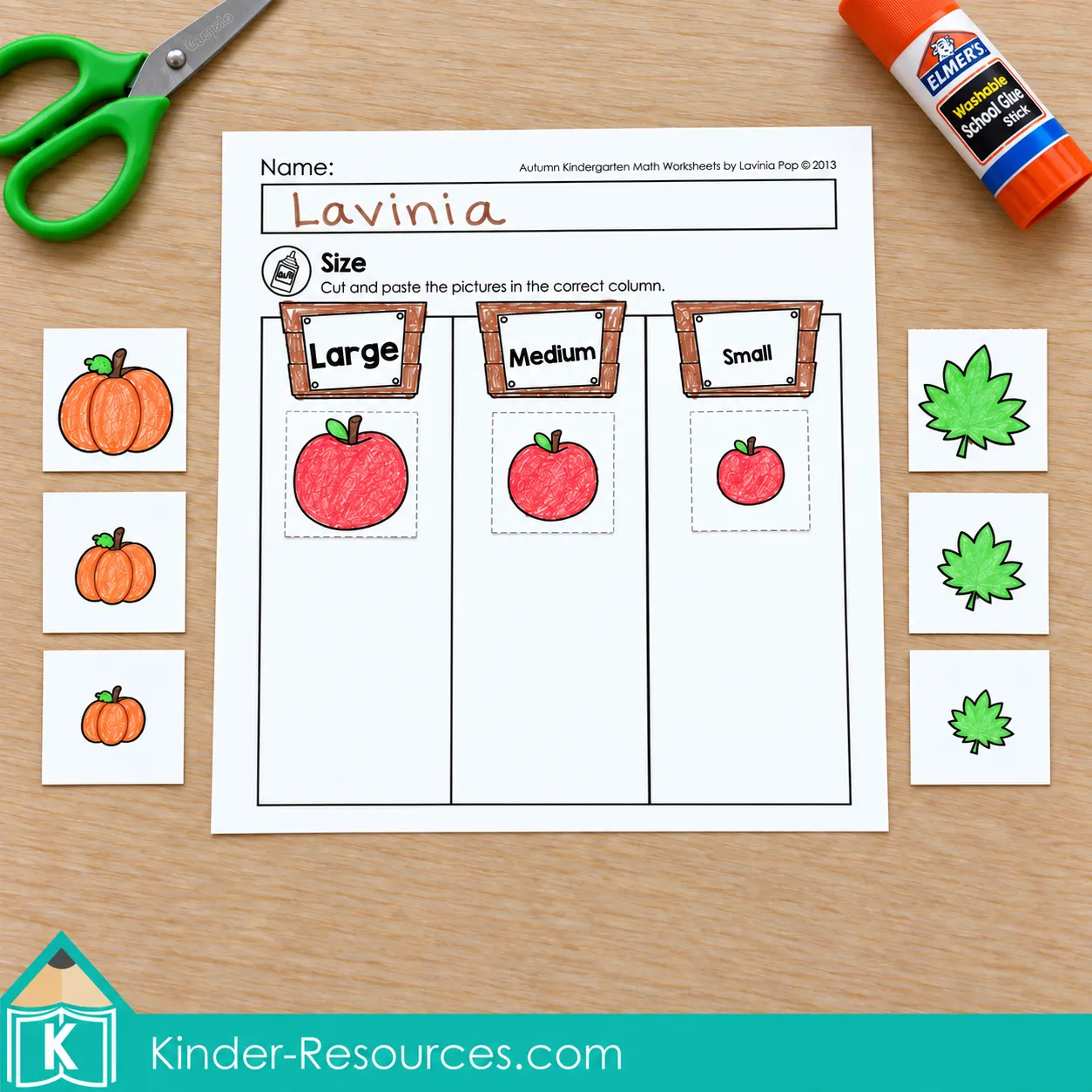 Autumn kindergarten sorting by size activity with pumpkins and leaves sorted into large, medium and small groups.
