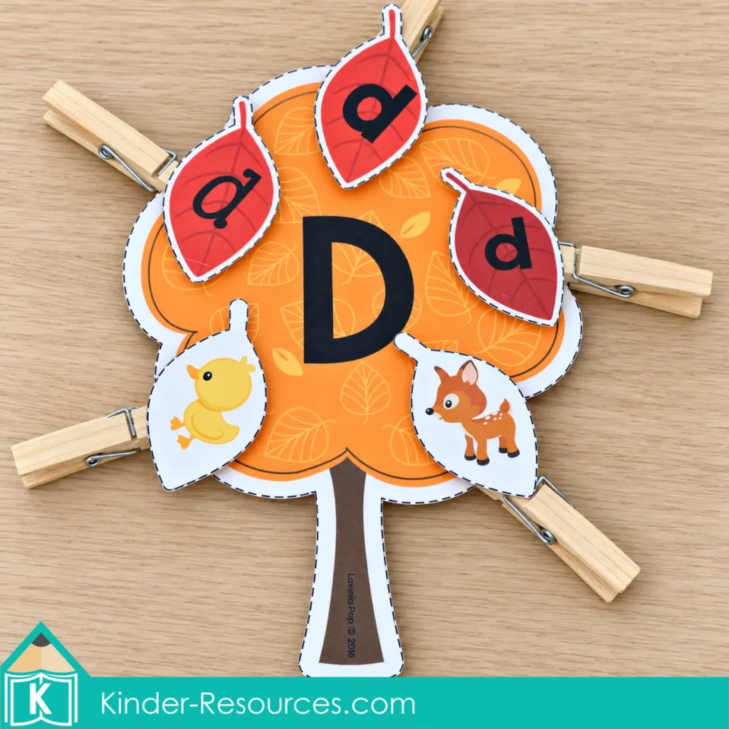 Letter D tree for fall preschool centers with lowercase d leaves and duck and deer picture leaves attached to clothespins.
