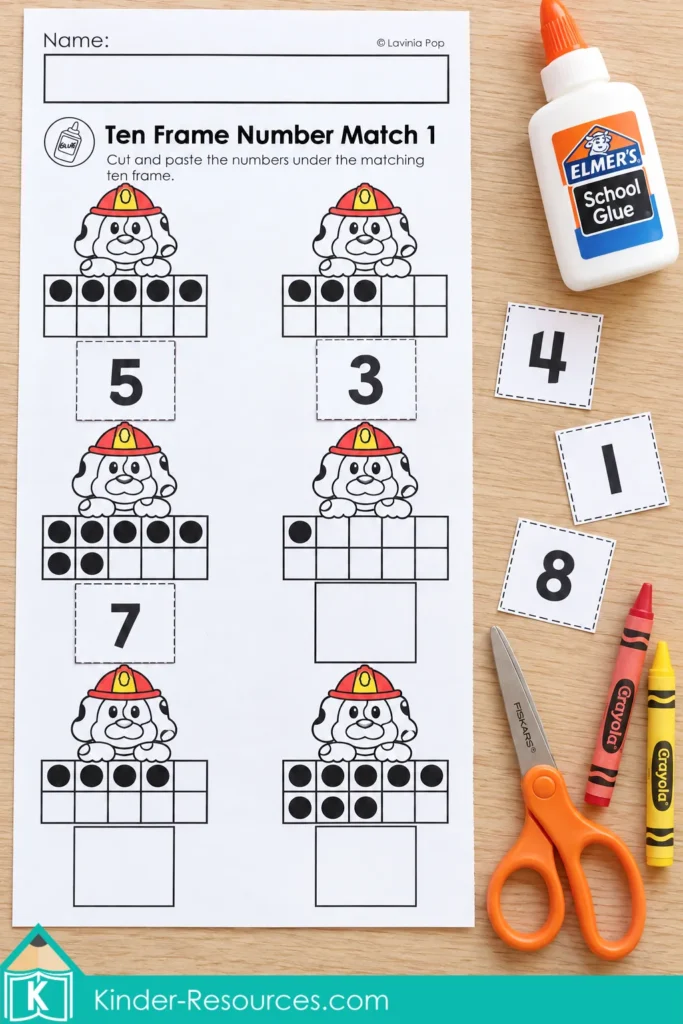 Kindergarten fire safety counting worksheet with firefighter dog ten frames, pasted number labels, and loose number cards for cut and paste practice