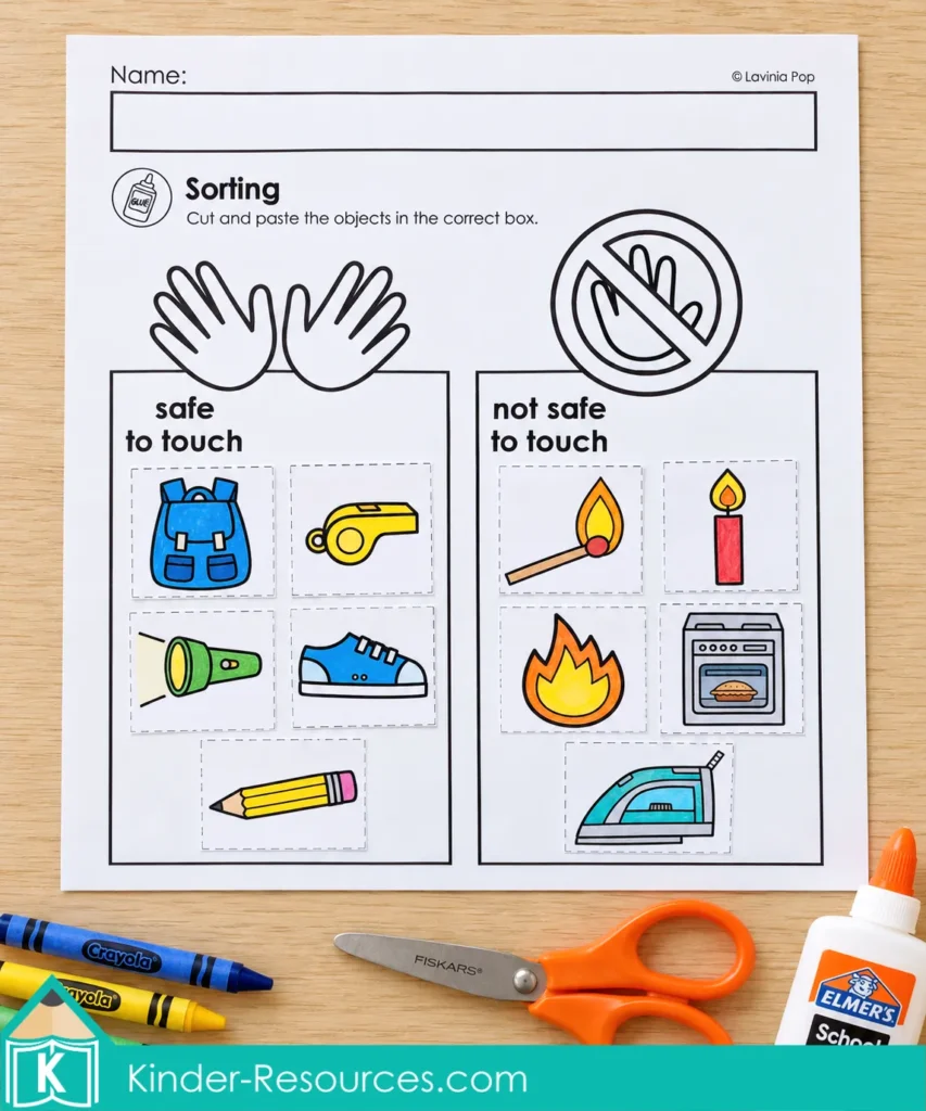 Kindergarten fire safety cut and paste worksheet with colored pictures sorted into safe to touch and not safe to touch columns.