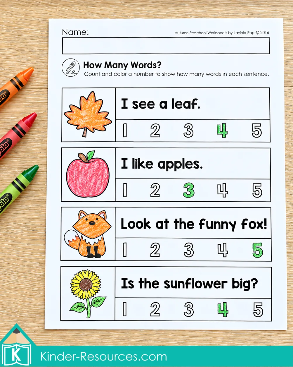 Preschool fall literacy worksheet with four illustrated sentences and colored answers showing how many words are in each sentence.